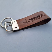 Custom laser-engraved leather keychain strap handcrafted by Grace Unbound