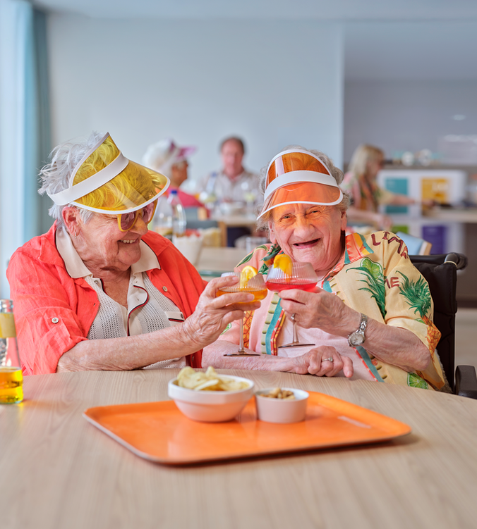 two elder ladies drinking mocktail, vibrant, colorfull