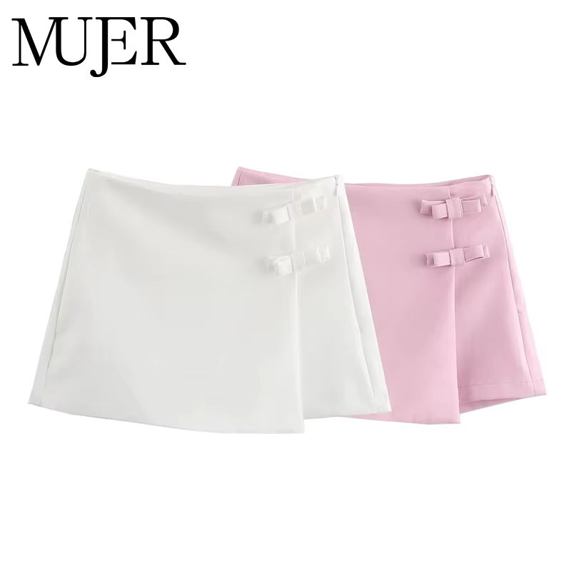 White and pink mini skirts with decorative buttons