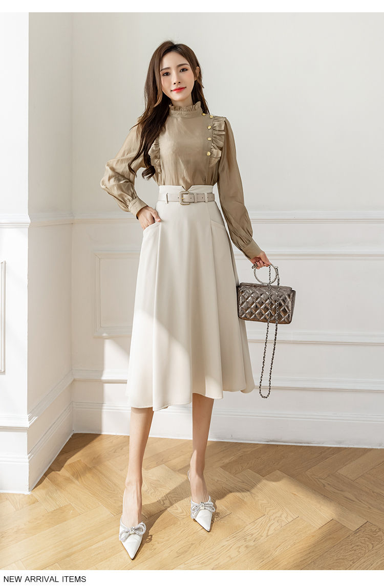 Thumbnail: Elegant light blouse and cream midi skirt