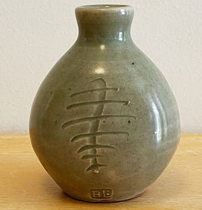 A small vase by Bernard Leach, impressed with B.L. Seal mark. St. Ives Pottery.