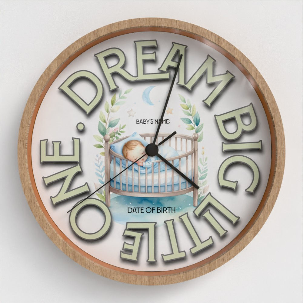 round clock with bamboo frame, white background and black arms. words Dream Big Little One with baby in a crib
