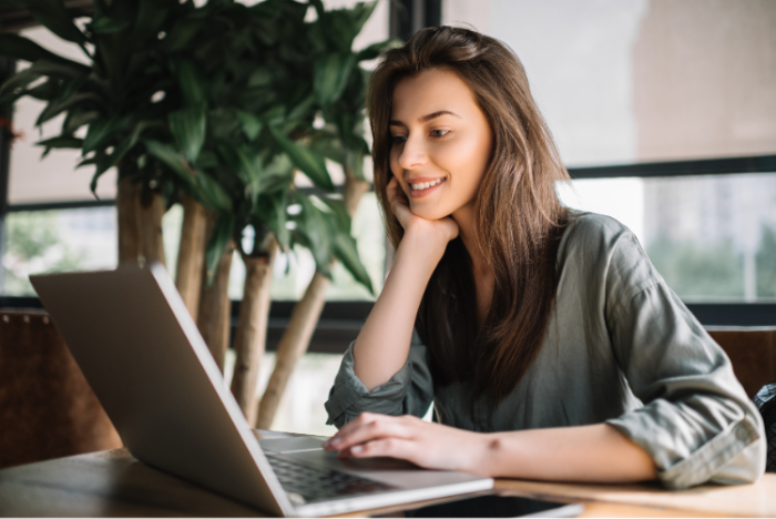 A woman working on a laptop