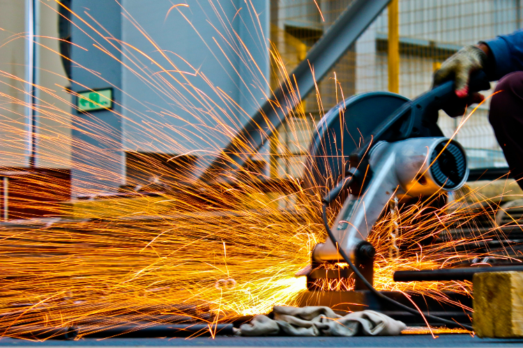 a chop saw cutting steel reinforcement