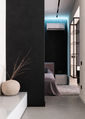 Chambre de style urbain avec un design moderne et minimaliste.