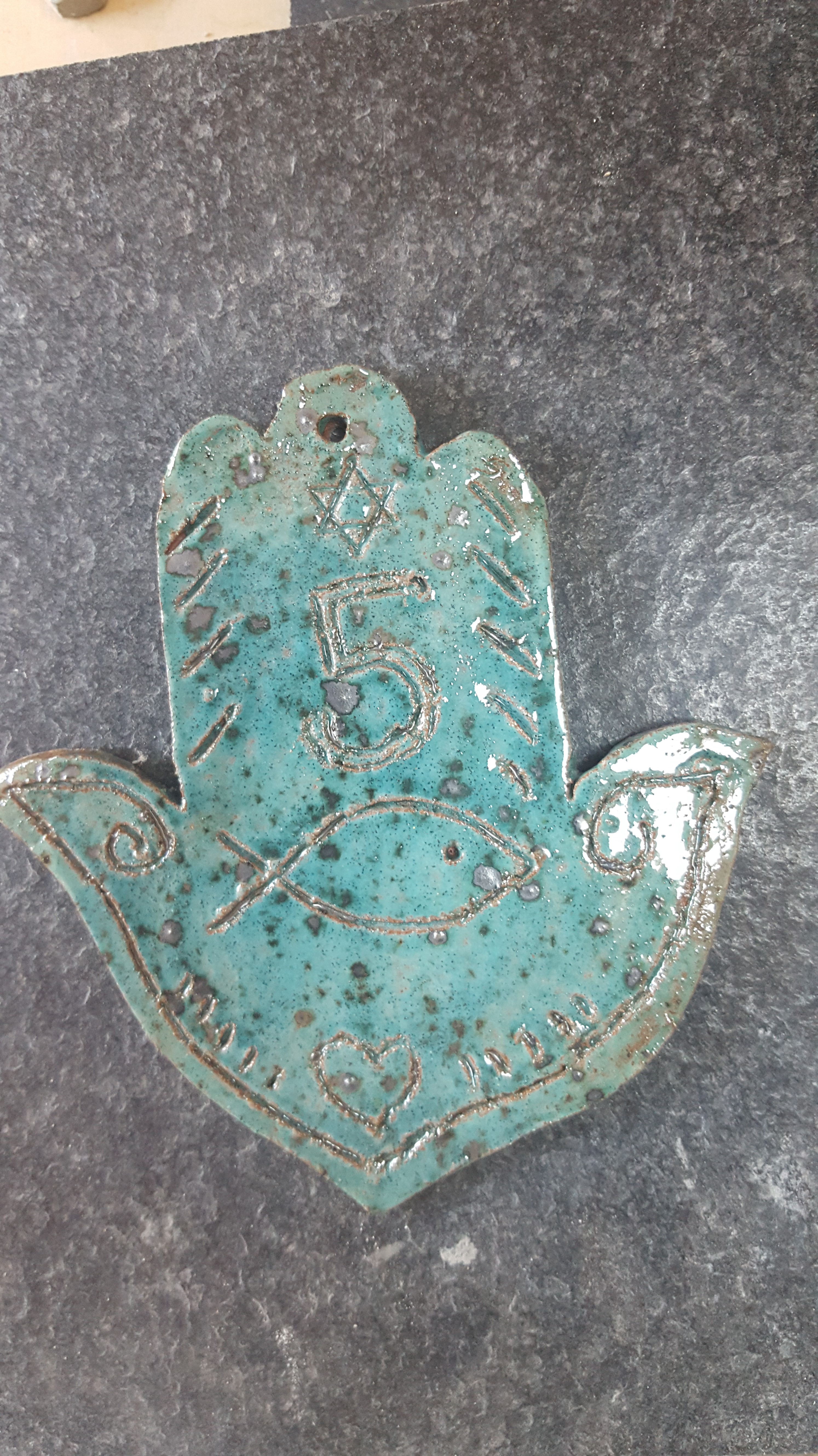 main hamsa 5 poissons
