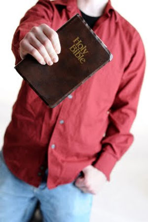 Man holding Bible