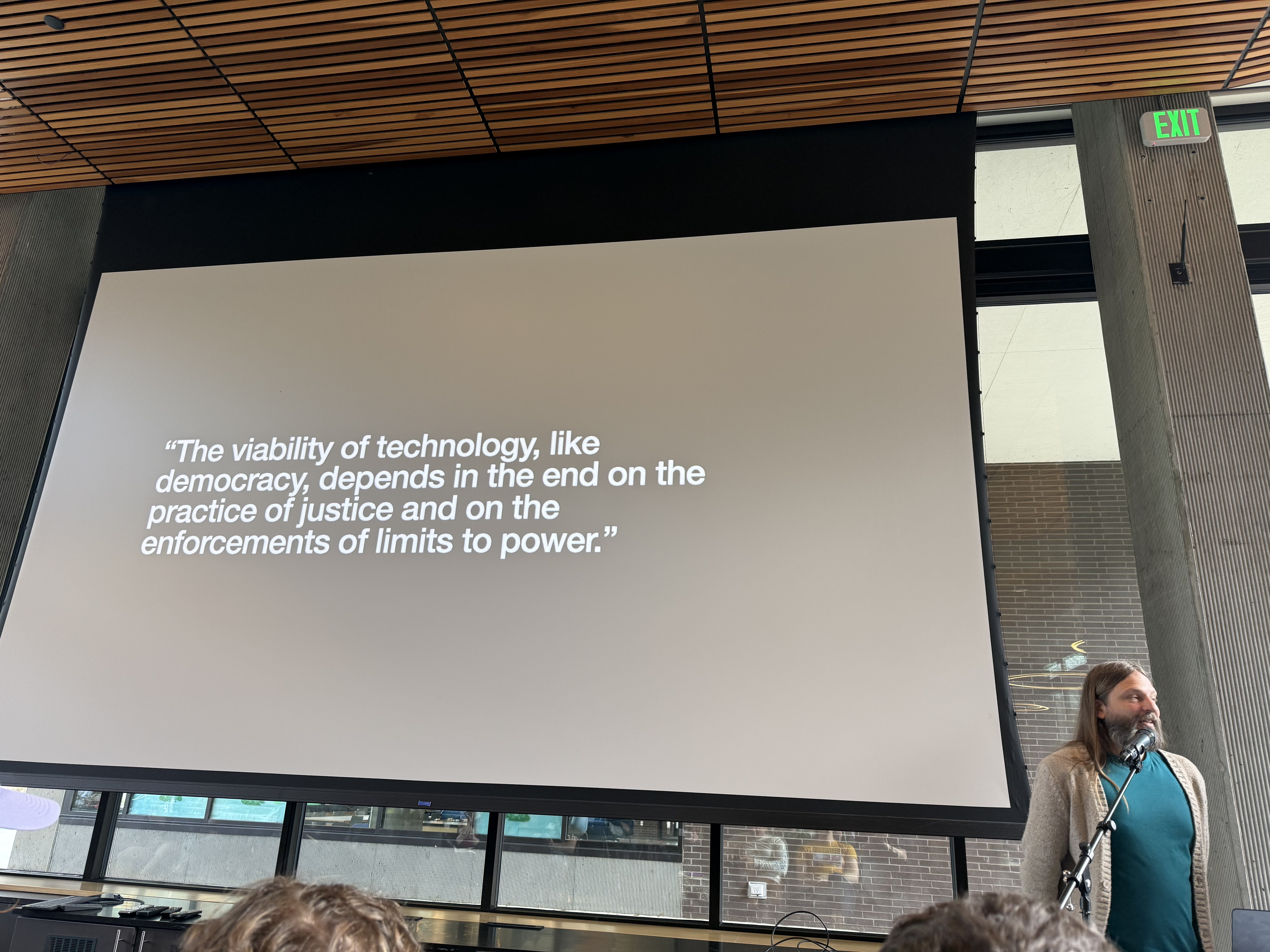 a photo of Blaine Cook speaking at the conference in Seattle