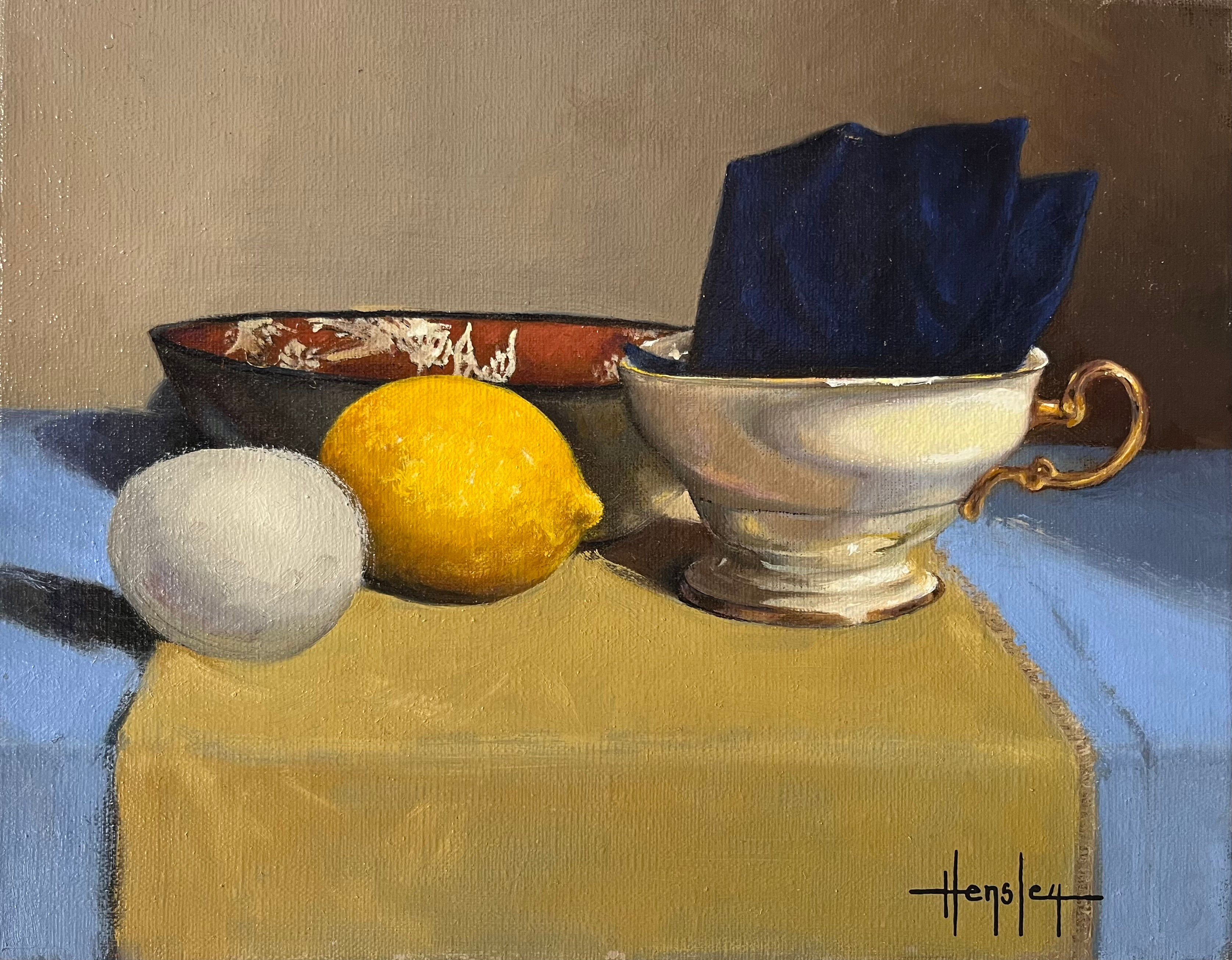 Lemon and Egg on Blue Table