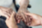 Close up of hands holding each others
