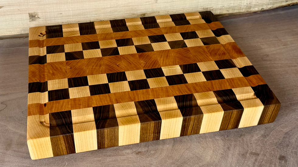 Maple cutting board with cherry wood checkerboard pattern