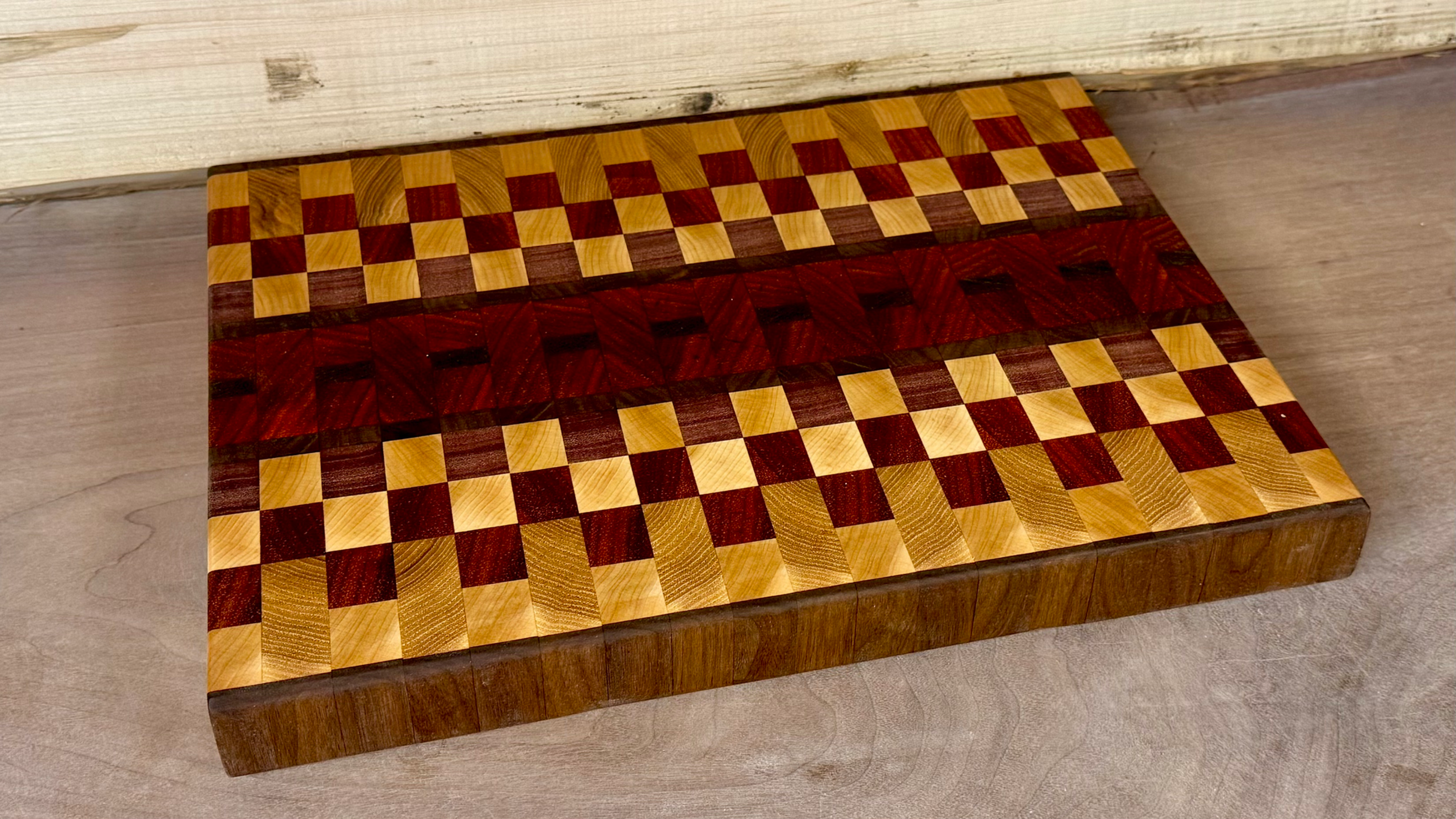 Cherry stripes on Maple 13” L cutting board