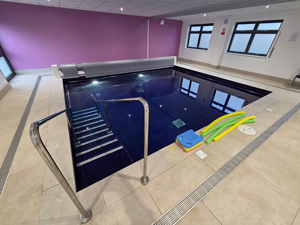 Eye-level view of a serene hydrotherapy pool surrounded by natural elements