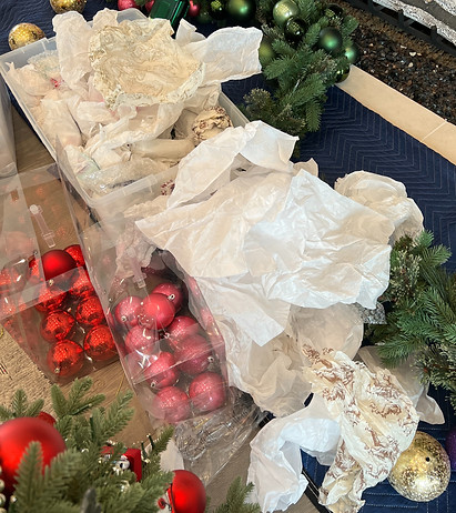 Christmas ornament being packaged to be stored away