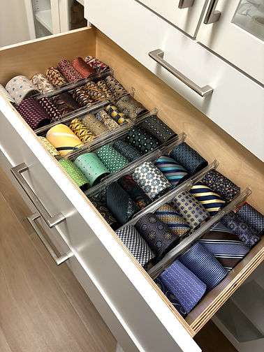 Perfectly organized ties with clear dividers by a professional organizer in Scottsdale, AZ