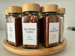 Professionally organized spices on a lazy susan by the professional organizer of Professional Organizing Plus in Arcadia, AZ