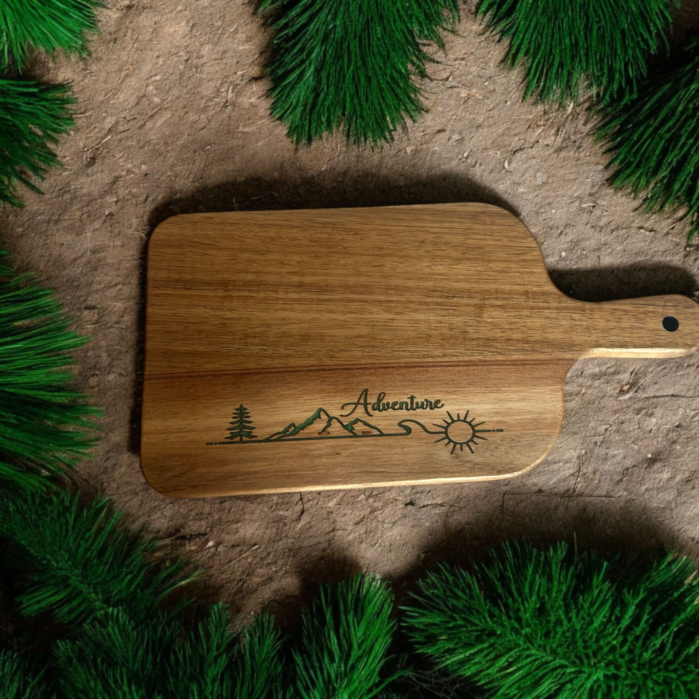 Small acacia chopping board with resin filled engraving 