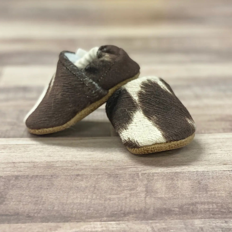 Thumbnail: Faux Cow Hide Moccasins