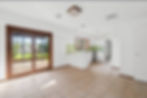 Modern kitchen with white walls painted by a painting company