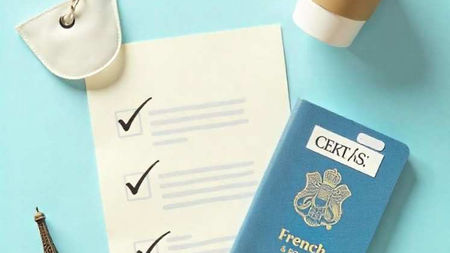"A minimalist flat design illustration featuring a passport with a French visa sticker, a document checklist, a tiny Eiffel Tower, and a coffee cup (symbolizing Parisian café culture). Soft blue and cream tones with clean lines, a checkmark icon, and a dotted line guiding the eye from 'application' to 'approved.'"