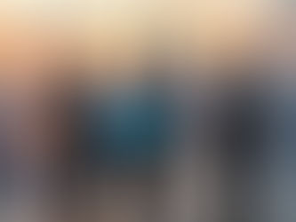 Diverse group of high-net-worth investors from Mainland China, Southeast Asia, and the Middle East reviewing financial data overlooking the Hong Kong skyline, representing the 2026 CIES investment boom.