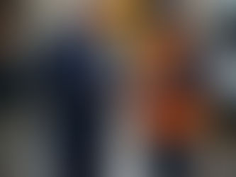 UK government official checking gig worker documents on digital tablet, showing new right-to-work verification process for delivery drivers and flexible jobs