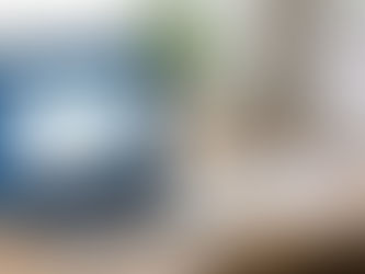 Laptop screen displaying USCIS H-2B Supplemental Visa Cap lottery confirmation, with printed petition documents and a US flag on a desk, calendar showing February 6, 2026 circled.