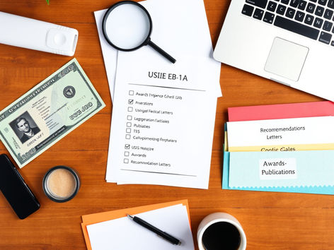 EB-1A evidence checklist with required documents for extraordinary ability green card including award certificates, publications, and expert letters arranged on desk with laptop and USCIS website
