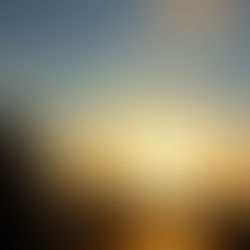 Sunrise over Tijuana and Monterrey skyline as U.S. lifts Mexico travel alert 2026. Golden light symbolizes normal operations resuming. Distant storm clouds over Jalisco represent continued curfew. U.S. government vehicle departs border.