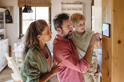 family changing thermostat