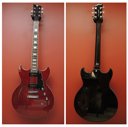 Reverend Manta Ray semi‑hollow electric guitar with korina body, maple top and neck, and rosewood fingerboard.