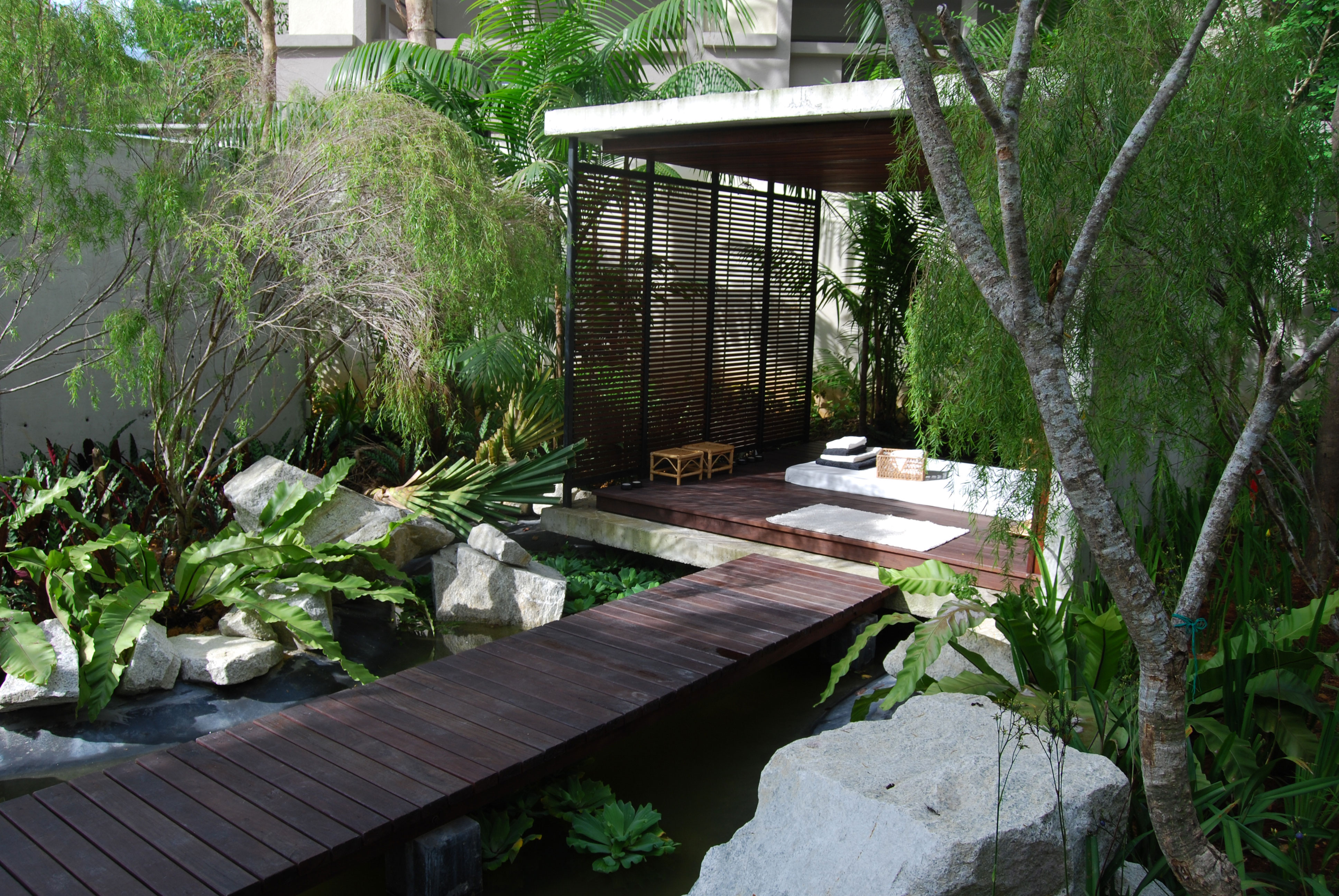 Hijauan Kiara: a spa cabana beside the koi pond