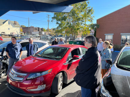 Electric vehicle charging at a workplace