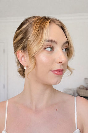 Radiant bridal makeup look with pink tones 