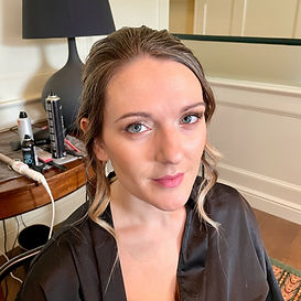 Radiant and glowy makeup for a bridesmaid