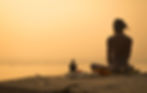 Indian Priest Meditating at Sunset_edited.jpg