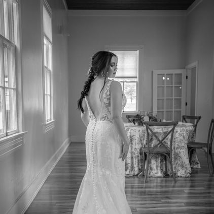 Bride with glowing skin and soft neutral glam makeup smiling before ceremony. st. louis bridal makeup artist