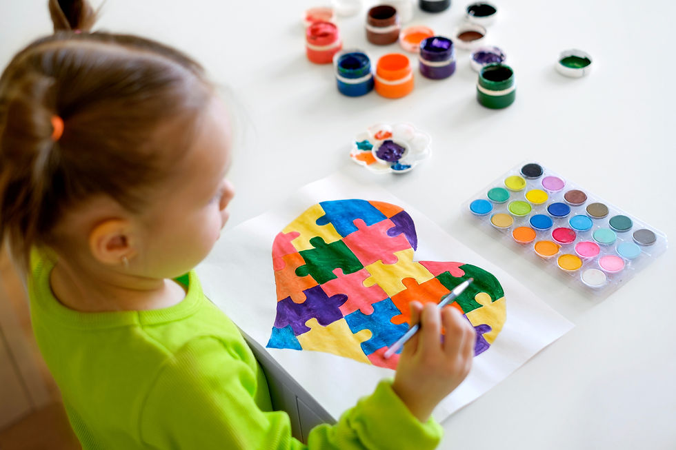 Baby draws a multicolored heart with gouache Drawing with watercolor paints as a gift for 