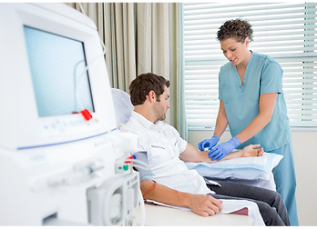 A patient receives treatment in a medical setting.
