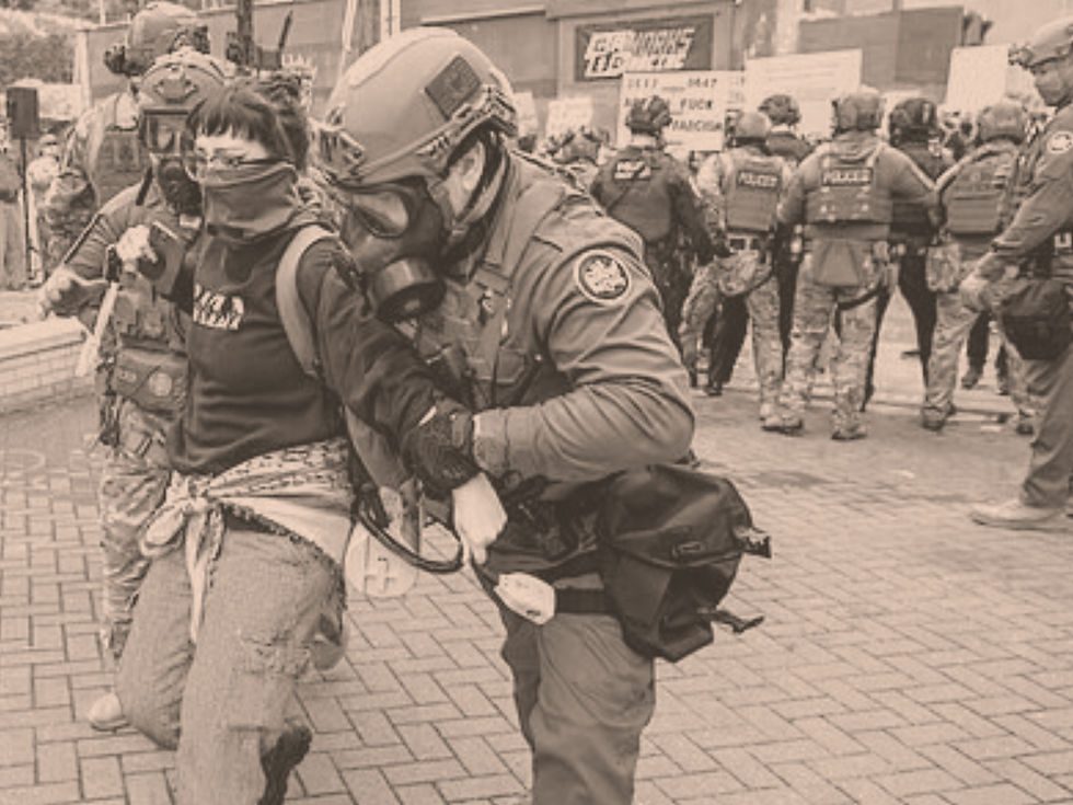 ICE agents detaining a person during public immigration enforcement