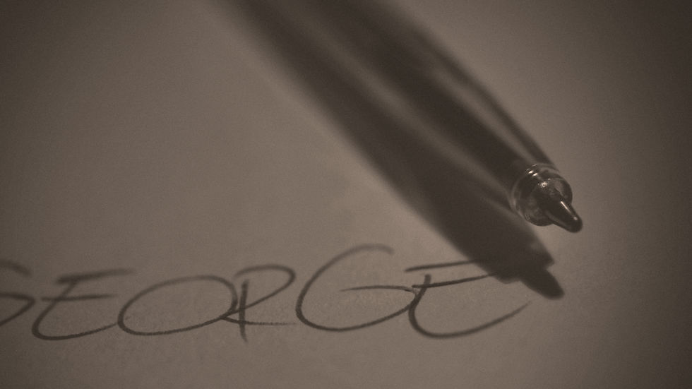 A pen resting on paper, representing beneficiary designations that control asset transfers and can override an Ohio estate plan.