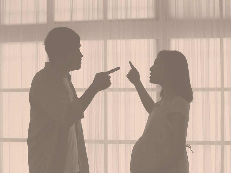 Ohio family reviewing a will while discussing a potential will contest