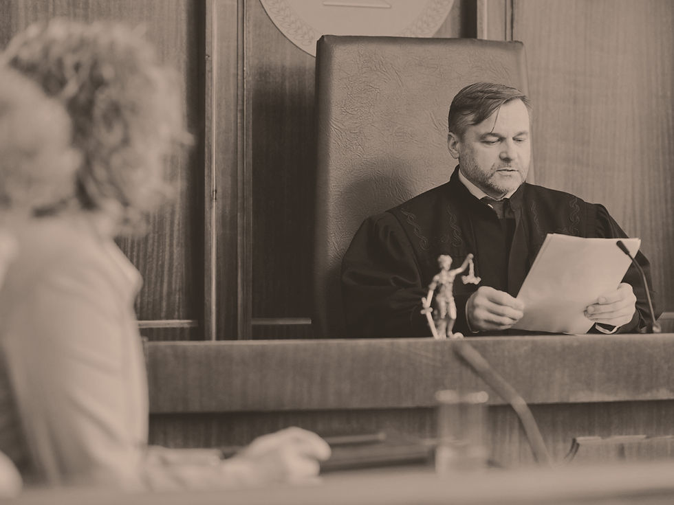 judge reviewing paperwork during dui arraignment hearing in ohio courtroom