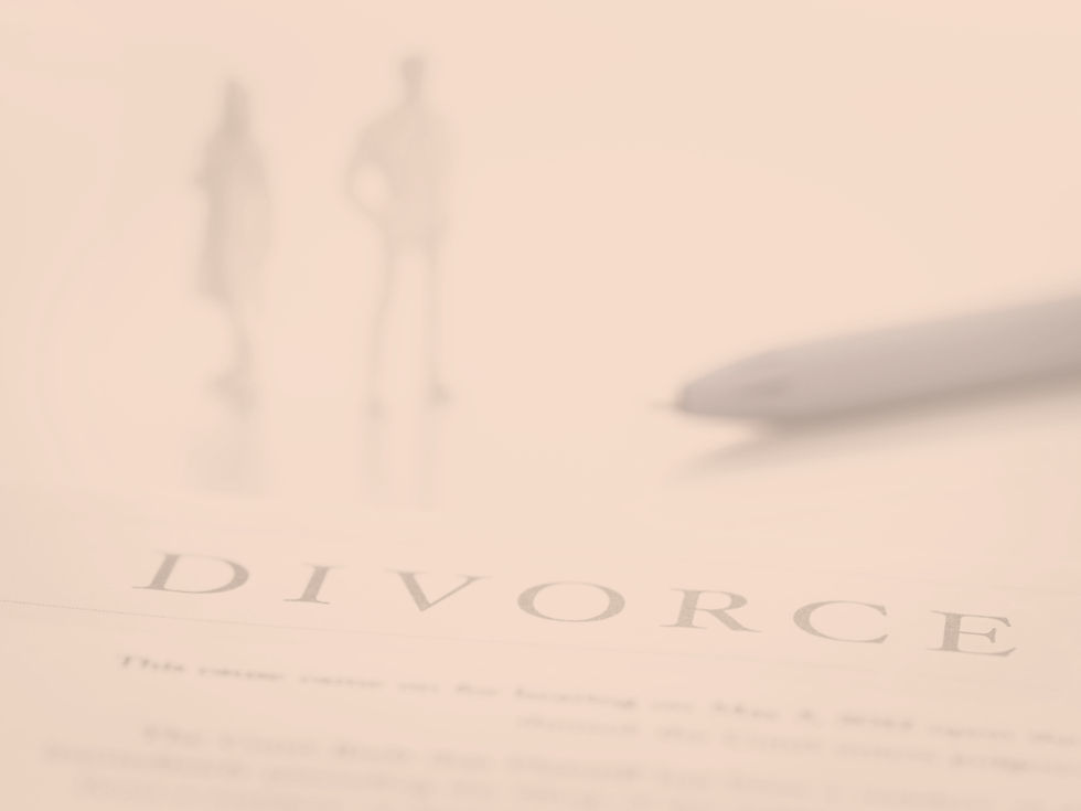 Recently divorced Ohio resident reviewing estate planning documents with an attorney