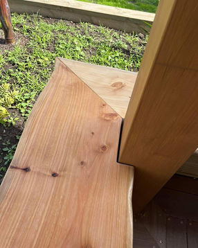 Wooden bench and decking built by Dreamspace 