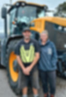 Marsh Contracting owners Ben and Tammy standing in front of their JCB Fastrac tractor – experienced agricultural contractors in the Bay of Plenty.