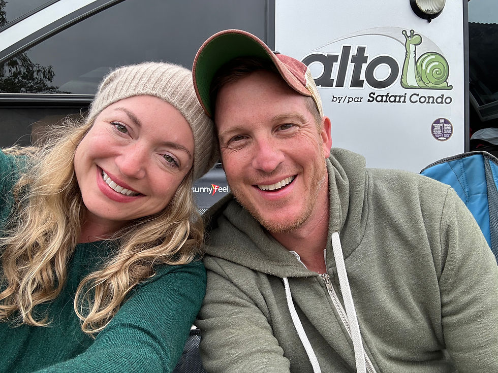 Camping and smiling.