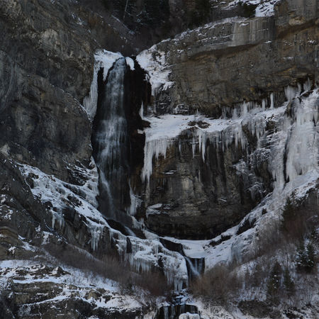 Frozen Bridal Veil Falls in Provo Canyon Utah with ice-covered cascading water and icy rock formations