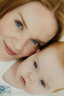 Close up mum and baby portrait taken during a natural baby photography session in North London.
