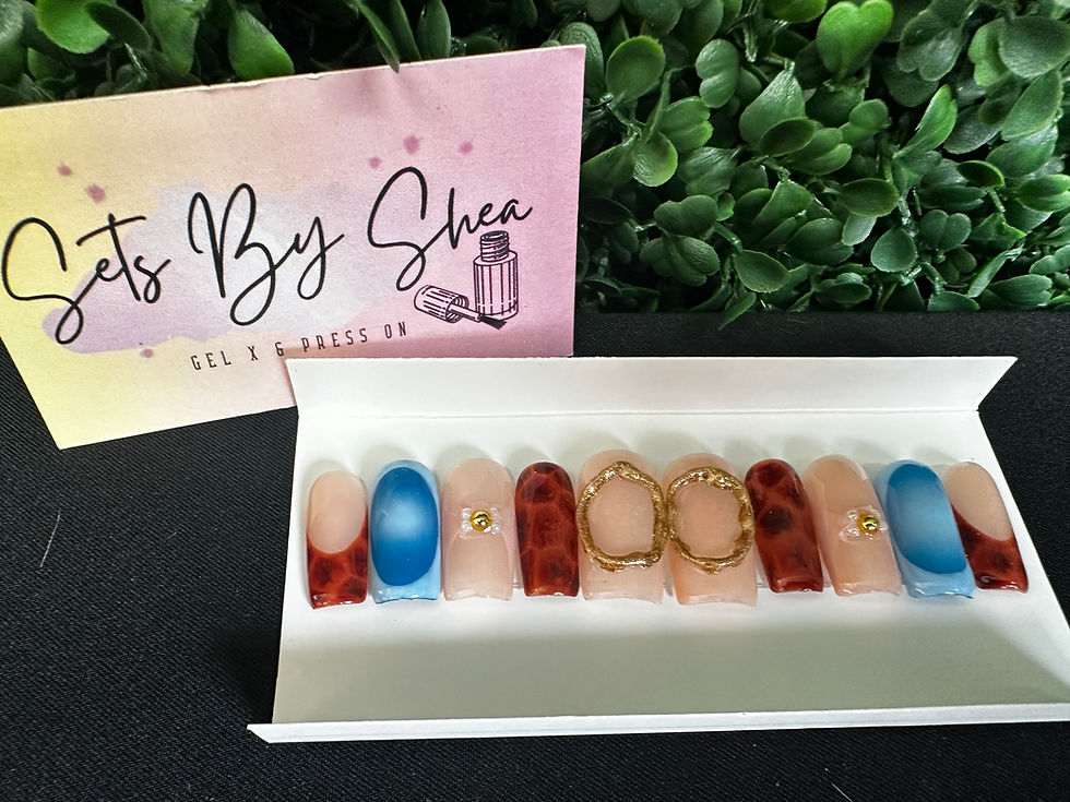 Thumbnail: Long press on nails in nude, red and gold design